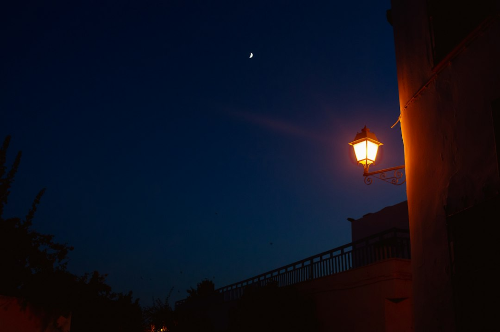 A street lamp lighting the night sky - Light, Education and Health