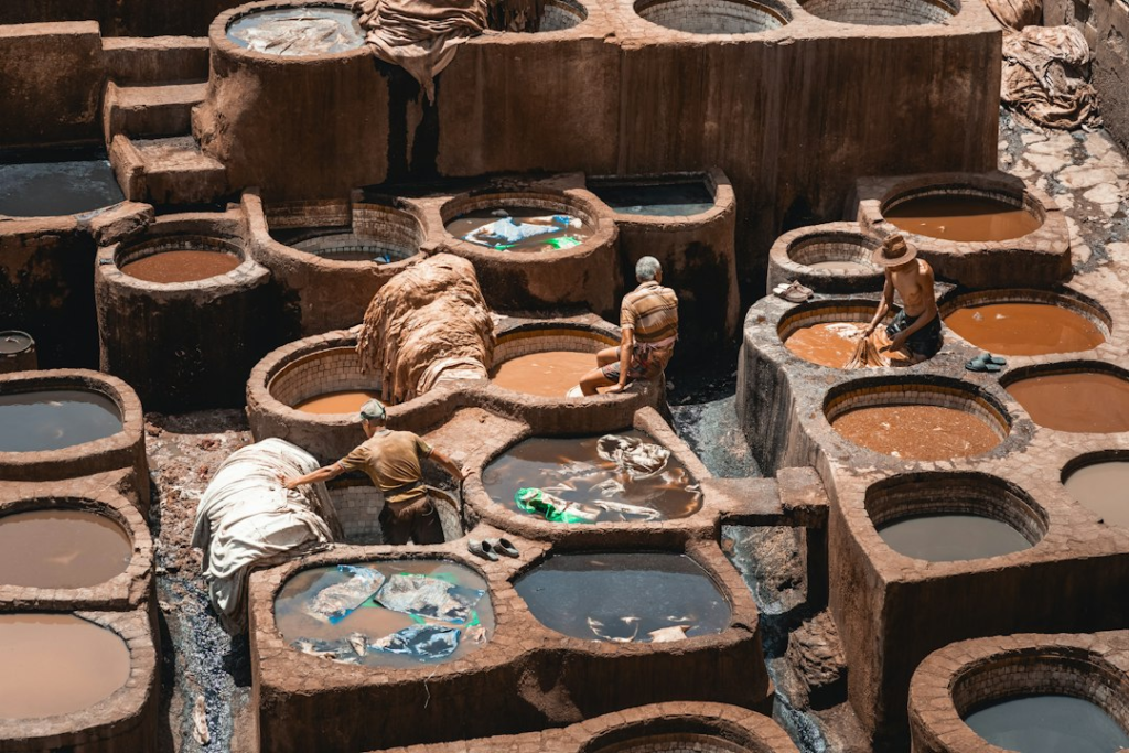 Clay pots filled with clean water - Water Access and Sanitation